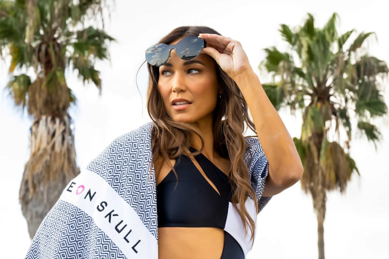 Hermosa Accessories Collection featuring beach hats, bags, and jewelry styled with luxury swimwear from Neon Skull
